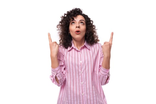 portrait of a successful young office secretary woman wearing a striped pink shirt.