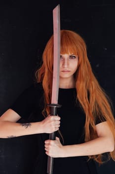 Girl anime with orange hair Japan cospley sword