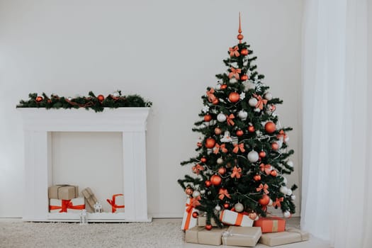 room decorated for the Christmas holidays new year tree gifts 2018 2019