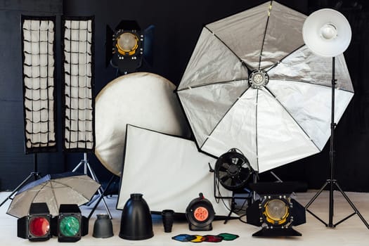 Photo studio equipment accessories photographer on black background