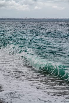 Big waves hitting the Konyaalti coast on a stormy day