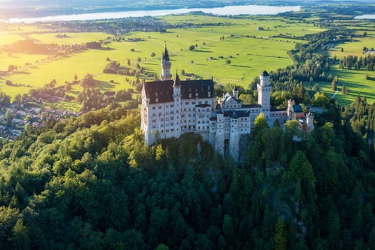 Famous Neuschwanstein Castle with scenic mountain landscape near Fussen, Bavaria, Germany. Neuschwanstein Castle in Hohenschwangau, Germany. 