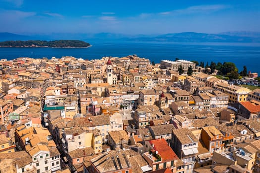 Panoramic view of Kerkyra, capital of Corfu island, Greece. Aerial drone view of Kerkyra with beautiful buildings during summer sunny day. Corfu island, Greece. 
