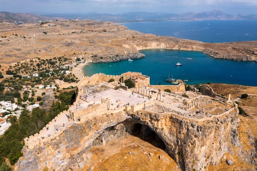 Ruins of Acropolis of Lindos view from above, Rhodes, Dodecanese Islands, Greek Islands, Greece. Acropolis of Lindos, ancient architecture of Rhodes, Greece. 
