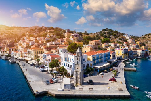 Aerial view of the beautiful greek island of Symi (Simi) with colourful houses and small boats. Greece, Symi island, view of the town of Symi (near Rhodes), Dodecanese.