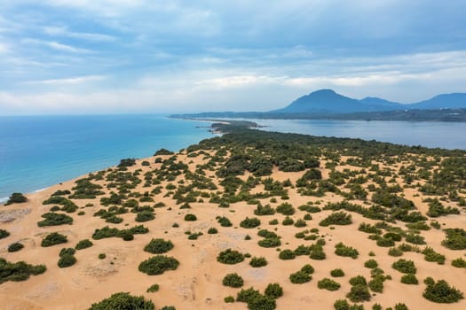 Issos beach on Corfu, near Agios Georgios, Greece. Aerial drone view of Issos beach and Lake Korission, Corfu island, Ionian Sea, Greece. Issos beach, Corfu Island.