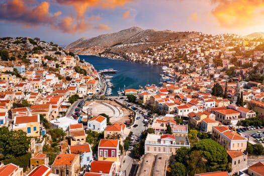 Aerial view of the beautiful greek island of Symi (Simi) with colourful houses and small boats. Greece, Symi island, view of the town of Symi (near Rhodes), Dodecanese.