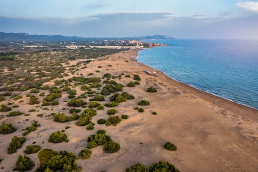 Aerial drone view over sand dunes close to Lake Korission. It is located in the southern part of Greek island of Corfu, Greece.