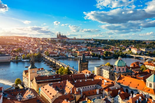 Prague scenic spring aerial view of the Prague Old Town pier architecture Charles Bridge over Vltava river in Prague, Czechia. Old Town of Prague with the Castle in the background, Czech Republic.