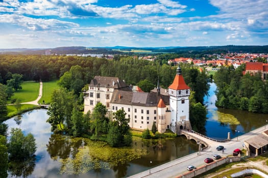 Blatna castle near Strakonice, Southern Bohemia, Czech Republic. Aerial view of medieval Blatna water castle surrounded parks and lakes, Blatna, South Bohemian Region, Czech Republic.