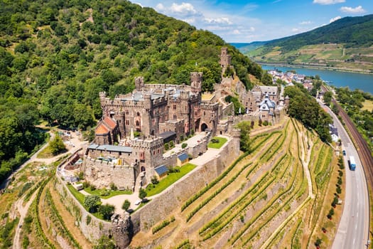 Reichenstein Castle with Clemenskapelle, Trechtingshausen on the Rhine river. Middle Rhine Valley, Rhineland-Palatinate, Germany, Europe. Reichenstein castle in the valley of medieval castles.