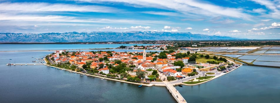 Historic town of Nin laguna aerial view with Velebit mountain background, Dalmatia region of Croatia. Aerial view of the famous Nin lagoon and medieval in Croatia