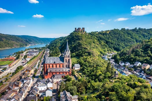 View over the town of Oberwesel, Upper middle Rhine Valley, Germany. Oberwesel town and Church of Our Lady, Middle Rhine, Germany, Rhineland-Palatinate. Oberwesel town at riverside of Rhein river.
