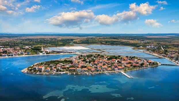 Historic town of Nin laguna aerial view with Velebit mountain background, Dalmatia region of Croatia. Aerial view of the famous Nin lagoon and medieval in Croatia