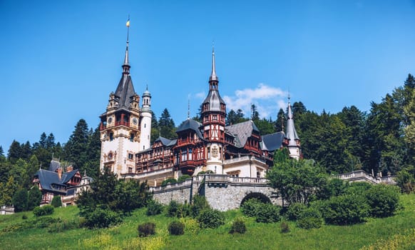 Peles Castle, Romania. Beautiful famous royal castle and ornamental garden in Sinaia landmark of Carpathian Mountains in Europe