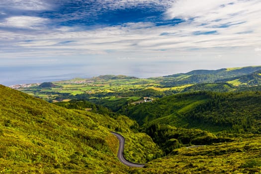 Azores panoramic view of natural landscape, wonderful scenic island of Portugal. Beautiful lagoons in volcanic craters and green fields. Tourist attraction and travel destination. Azores, Portugal.