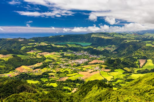 Landscape view in Salto do Cavalo (Horse Jump) with the Lagoon of Furnas in the Background, São Miguel island, Azores, Portugal. Miradouro do Salto do Cavalo in Sao Miguel, Azores, Portugal