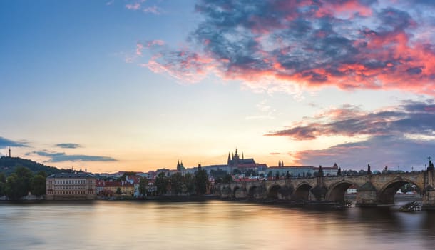 Famous iconic image of Charles bridge, Prague, Czech Republic. Concept of world travel, sightseeing and tourism.