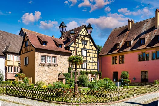 Traditional timbered house in Turckheim, Alsace, France. One of the famous cities in Alsace scenic route near Colmar, France. Colorful traditional french houses in Turckheim town of Alsace, France.
