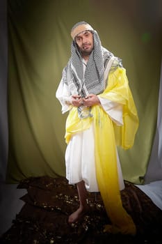 An imposing man in stylized eastern attire, Sheikh or Sultan in Israel, Palestine, and Iran. Photoshoot with a male model