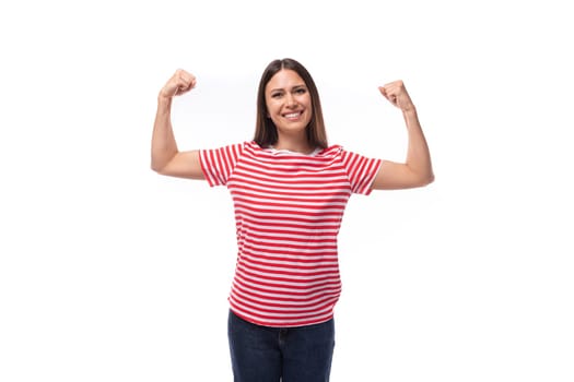 pretty young caucasian promoter woman with straight hair in glasses and in a striped red t-shirt on a white background with copy space.