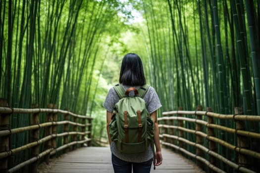 Eco travel and responsible tourism. Asian woman walking at Bamboo Forest, rear view. AI Generated