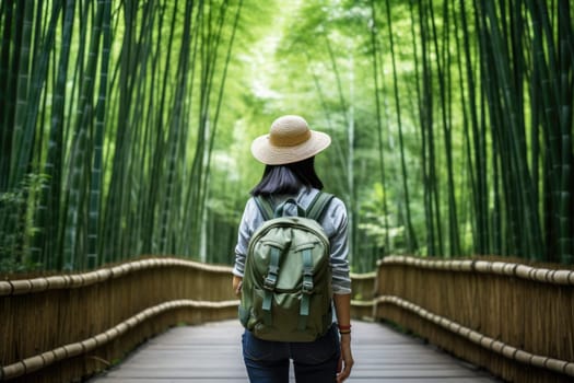 Eco travel and responsible tourism. Asian woman walking at Bamboo Forest, rear view. AI Generated