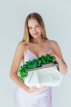 Female holding bag with vegetables for eating