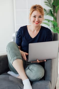 woman working online on computer at home
