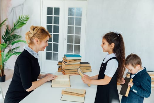 Children answer a question to a teacher school