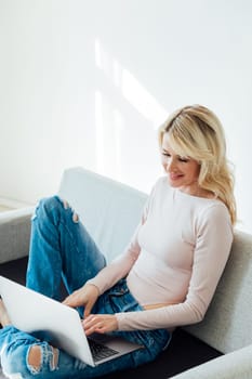 woman with computer working online from home