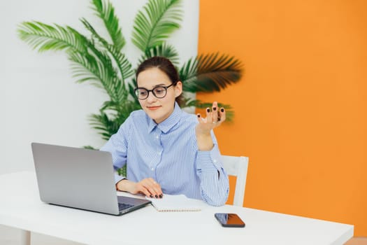 woman in office working online on computer