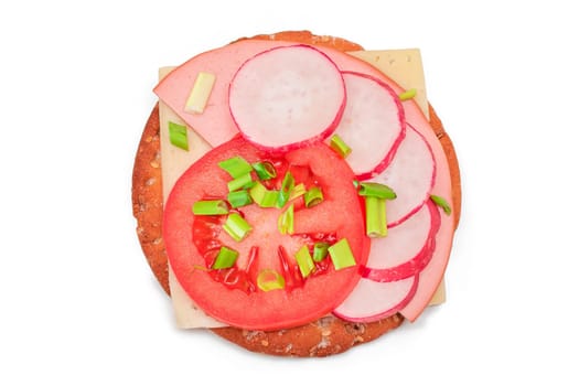 Crispy Cracker Sandwich with Tomato, Sausage, Cheese, Green Onions and Radish - Isolated on White. Easy Breakfast. Diet Food. Quick and Healthy Sandwiches. Crispbread with Tasty Filling - Isolation