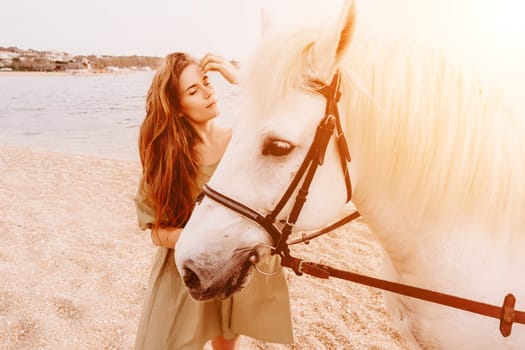 A white horse and a woman in a dress stand on a beach, with the sky and sea creating a picturesque backdrop for the scene