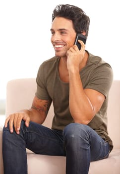 Phone call, communication and smile with man on sofa for contact, networking and social media. Conversation, technology and connection with person in living room at home for mobile and online.