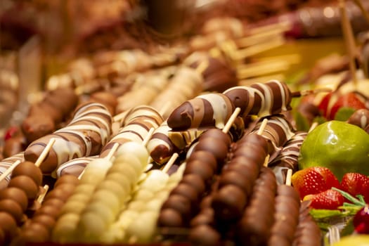 Chocolate fruits. Germany. Christmas market. High quality photo