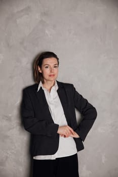 woman on gray background in office