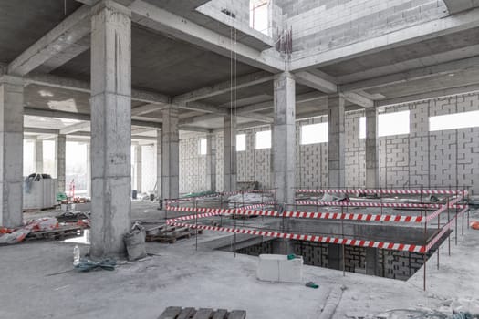 Staircase fencing at a construction site. construction of a reinforced concrete building frame.