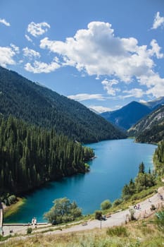 Kolsay lake in Kolsai Koldery gorge, nature of Kazakhstan National Park, vertical.