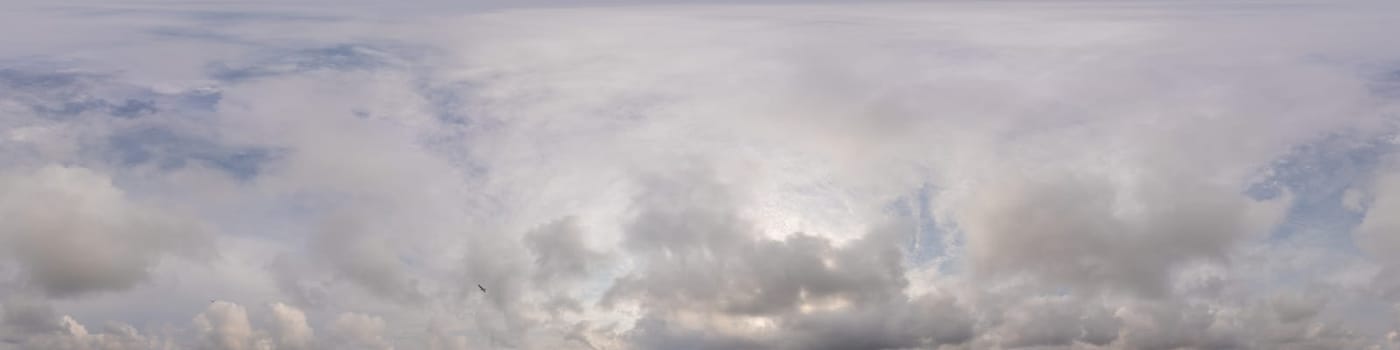 Sky panorama on overcast rainy day with low clouds in seamless spherical equirectangular format. Complete zenith for use in 3D graphics, game and for aerial drone 360 degree panorama as a sky dome.