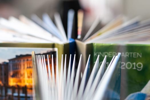 The spines of photo books. The view from the top. High quality photo