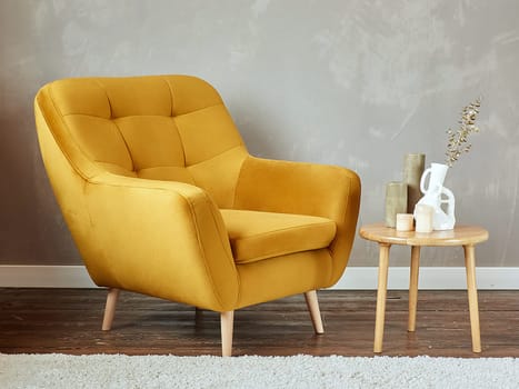 furniture, interior, home design. modern orange fabric armchair with wooden legs, side view