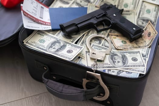 Open suitcase with one million dollars bills stacks. High quality photo