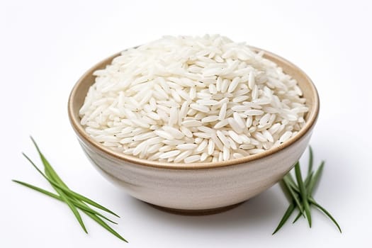 Rice grains in a wooden bowl on a white background.