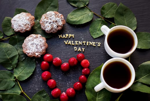 beautiful still life - Happy Valentine inscription, cherry, muffins, coffee