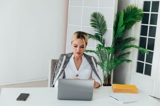 woman in office at computer