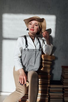 fashionable woman in vintage brimmed hat