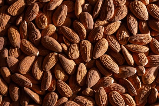 Scattered Almonds. Background from Almond Nuts. Natural High-Calorie Snacks