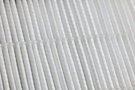 closeup full-frame view of white linear HEPA - high effective particle air - filter