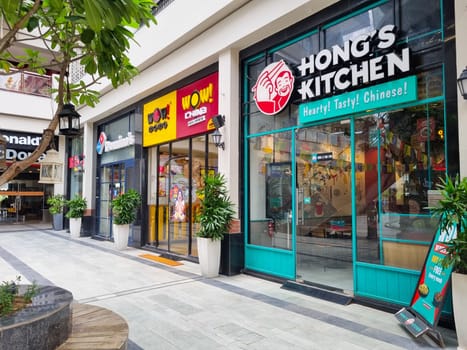 Gurgaon, Delhi, India - 17th Sept 2023: Three franchise offerings from Jubilant food works starup with cafes and home delivery of Wow Momos, Hongs Kitchen and Dominos